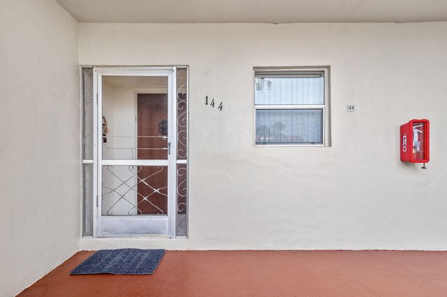 144 LAKE CAROL Drive, West Palm Beach, FL 33411