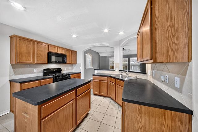 22414 Rumbling Creek Lane, Tomball, TX 77375