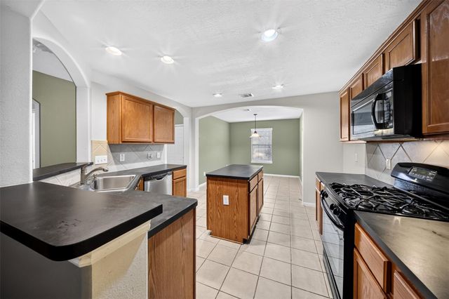22414 Rumbling Creek Lane, Tomball, TX 77375