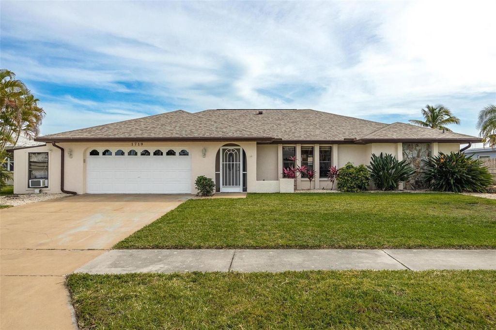 Image 1 of property listing at 1719 W BLUEWATER TERRACE, North Fort Myers, FL 33903