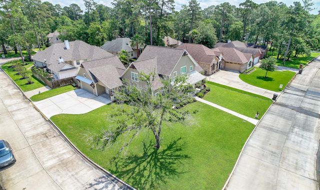 11939 Sagittarius Drive E, Willis, TX 77318