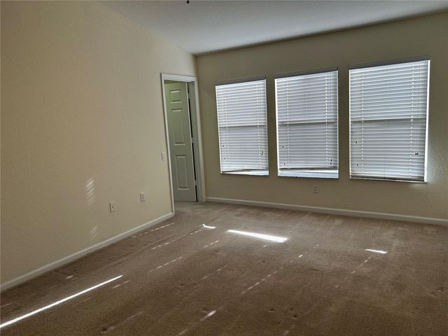 3497 SHALLOT DRIVE 104, Orlando, FL 32835