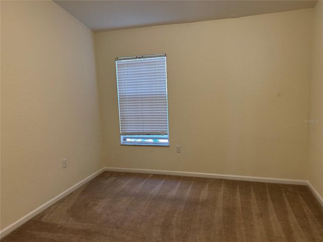 3497 SHALLOT DRIVE 104, Orlando, FL 32835