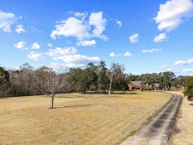 37093 521, Cedar Lane, TX 77415