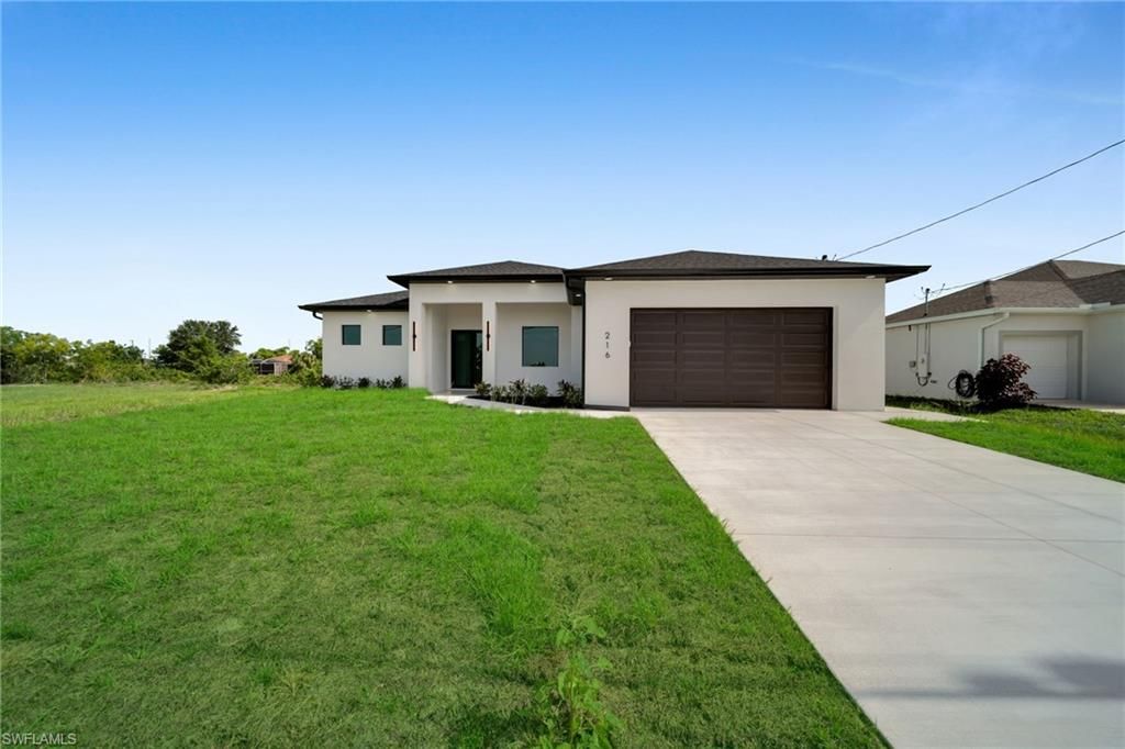 216 NE 25th TER, CAPE CORAL, FL 33909 — photo 2