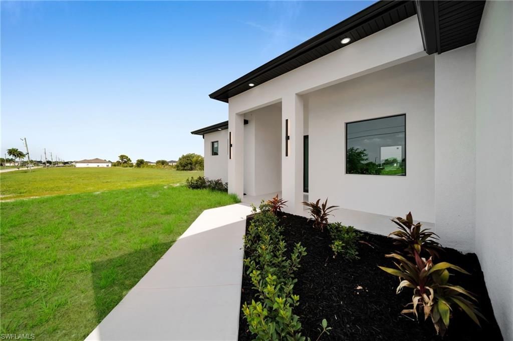 216 NE 25th TER, CAPE CORAL, FL 33909 — photo 4