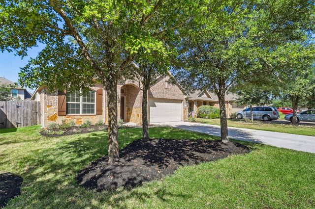637 Maple Point Drive E, Conroe, TX 77301