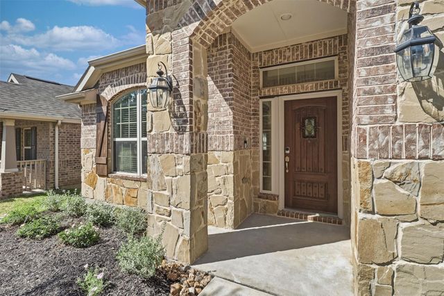 637 Maple Point Drive E, Conroe, TX 77301