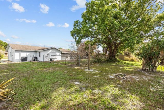 1250 SE Petunia Avenue, Port St. Lucie, Port St Lucie, FL 34952