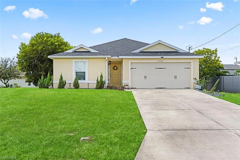 2104 NW 2nd PL, CAPE CORAL, FL 33993 — exterior