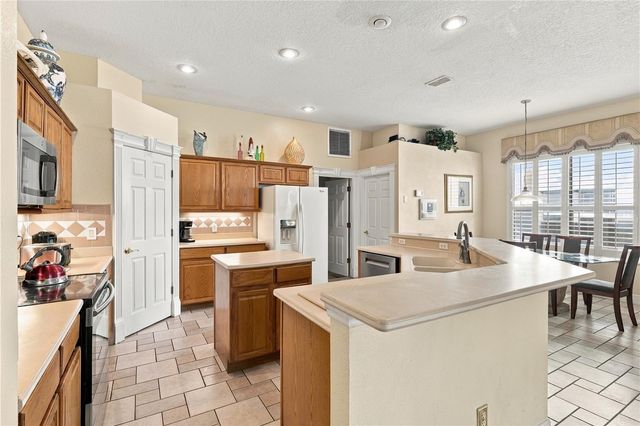 409 MCFEE DRIVE, Davenport, FL 33897