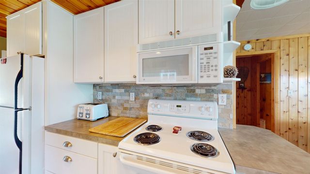 10701 SW Torch Lake Drive, Rapid City, MI 49676