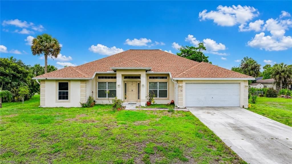20 Hampton AVE, LEHIGH ACRES, FL 33936 — exterior