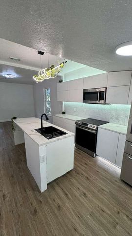 1118 E LINEBAUGH AVENUE, Tampa, FL 33612