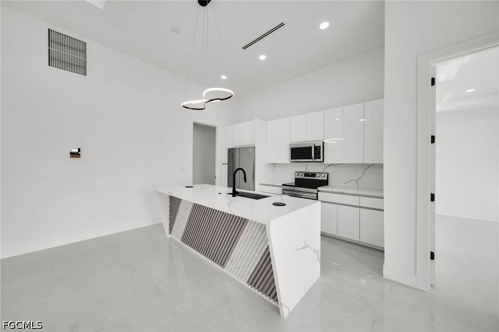 Image 10 of property listing at 2839 El Dorado BLVD N, Cape Coral, FL 33993