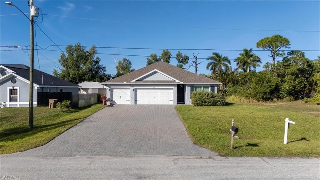 1216 NW 21st PL, CAPE CORAL, FL 33993 — photo 2