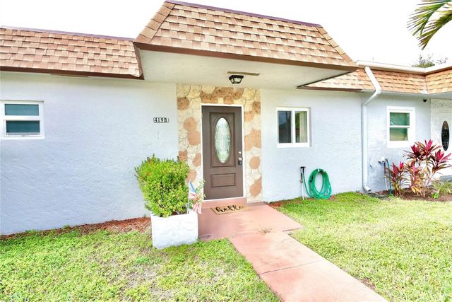 419 SW Natura Avenue B, Deerfield Beach, FL 33441