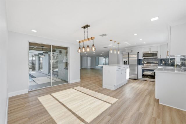 9821 LAKESIDE LANE, Port Richey, FL 34668