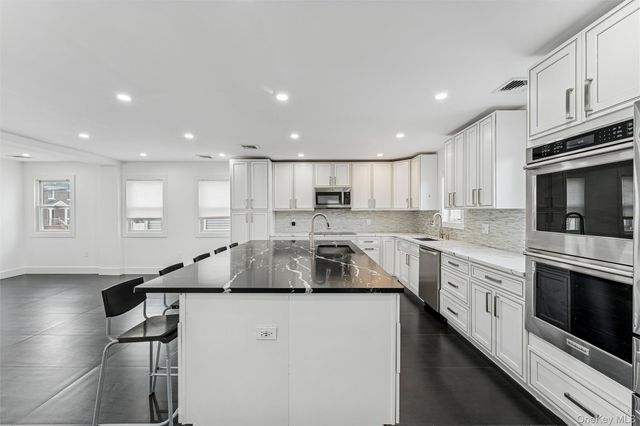 1064 Mora Place, Woodmere, NY 11598