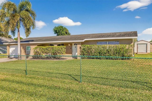 219 RICHMOND AVENUE S, Lehigh Acres, FL 33936