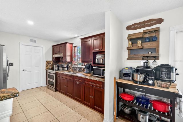 219 RICHMOND AVENUE S, Lehigh Acres, FL 33936