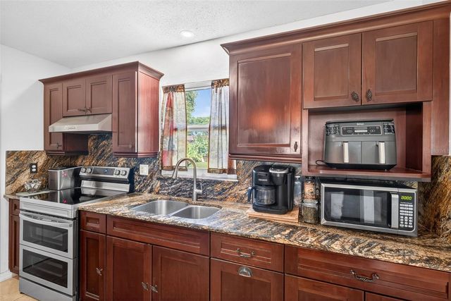 219 RICHMOND AVENUE S, Lehigh Acres, FL 33936