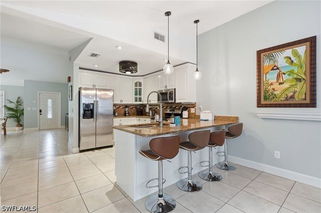 2548 River Reach DR, Naples, FL 34104