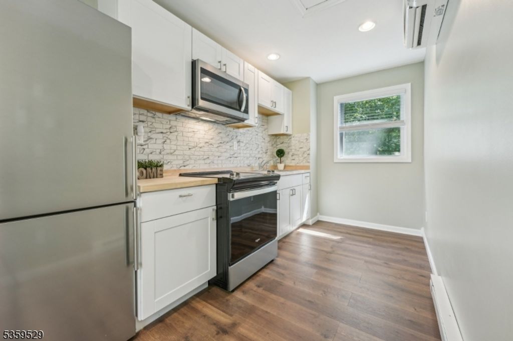 57 Riverlawn Dr, Wayne Twp., NJ 07470 — photo 2