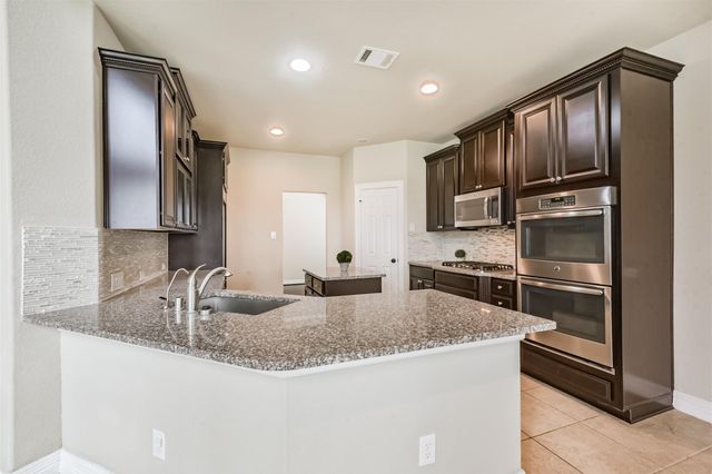 14823 Twin Waters Court, Houston, TX 77044