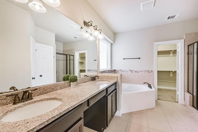 14823 Twin Waters Court, Houston, TX 77044