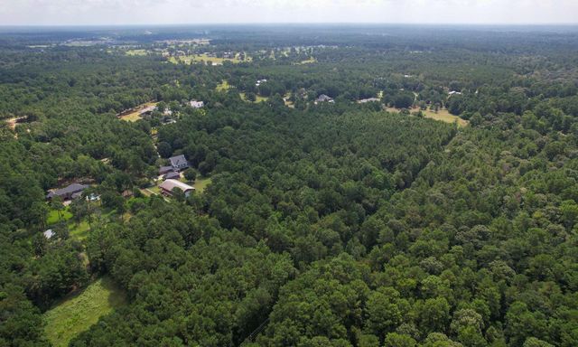 000 Whispering Meadow, Magnolia, TX 77355