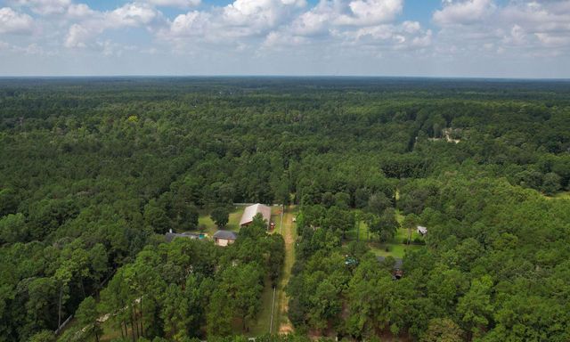 000 Whispering Meadow, Magnolia, TX 77355