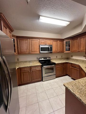 5554 METROWEST BOULEVARD 4-310, Orlando, FL 32811