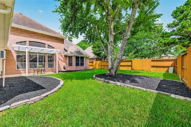 9614 Woodcliff Lake Drive, Spring, TX 77379