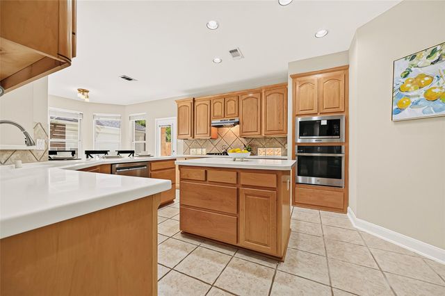 9614 Woodcliff Lake Drive, Spring, TX 77379