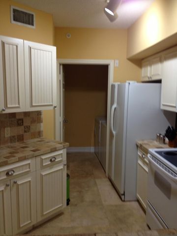 11760 SW SAINT ANDREWS Place 103, Wellington, FL 33414