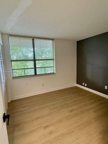 100 NW 76th Ave 404-2, Plantation, FL 33324