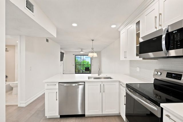 7209 Golf Colony Court, Greenacres, FL 33467