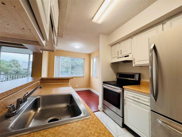 5780 Rock Island Road 377, Tamarac, FL 33319