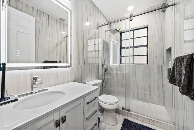 8060 Woodslanding Trail, West Palm Beach, FL 33411