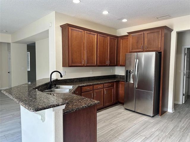7232 SEEDPOD LOOP, Wesley Chapel, FL 33545