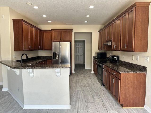 7232 SEEDPOD LOOP, Wesley Chapel, FL 33545