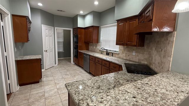 23114 Winding Knoll Drive, Katy, TX 77494