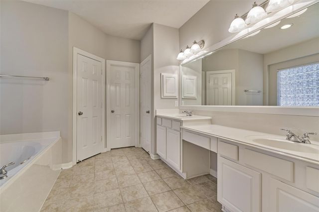 7 Raindance Court, The Woodlands, TX 77385