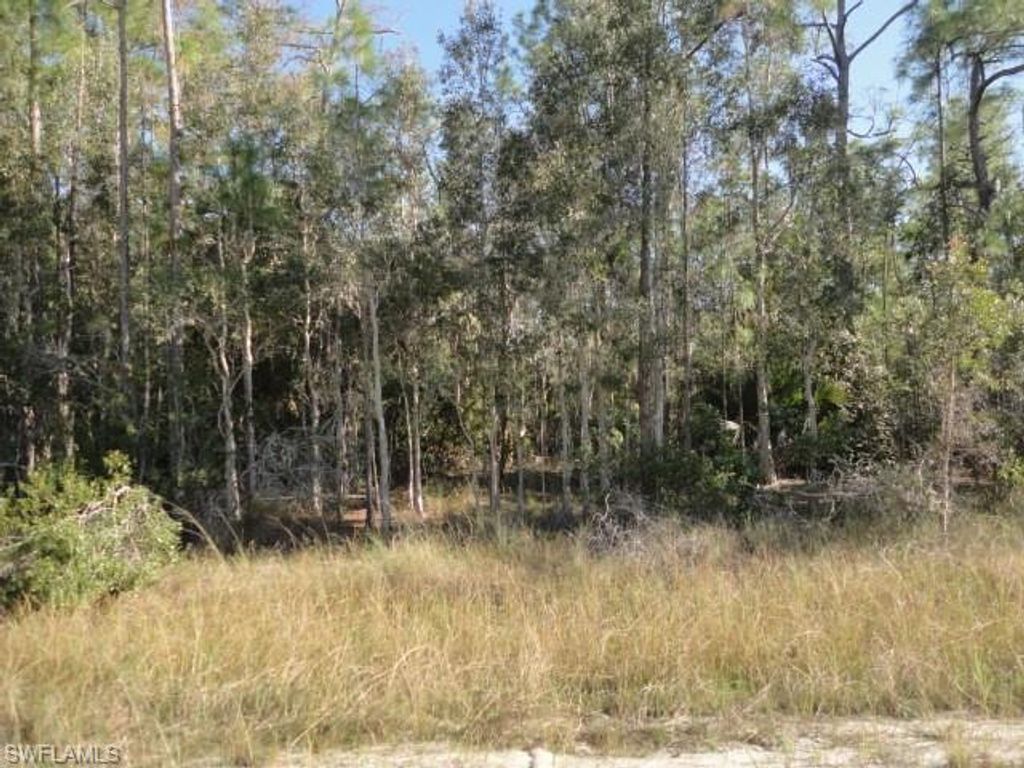 275 Woodburn DR, LEHIGH ACRES, FL 33972 — exterior