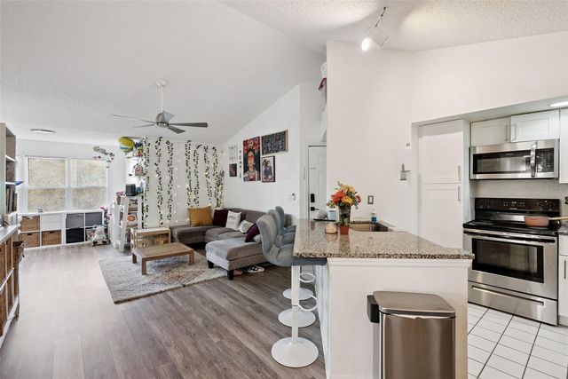 4642 COMMANDER DRIVE 938, Orlando, FL 32822