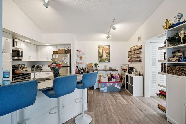 4642 COMMANDER DRIVE 938, Orlando, FL 32822