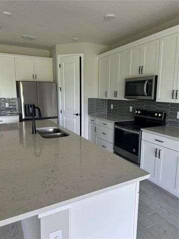 17663 SAW PALMETTO AVENUE, Clermont, FL 34714