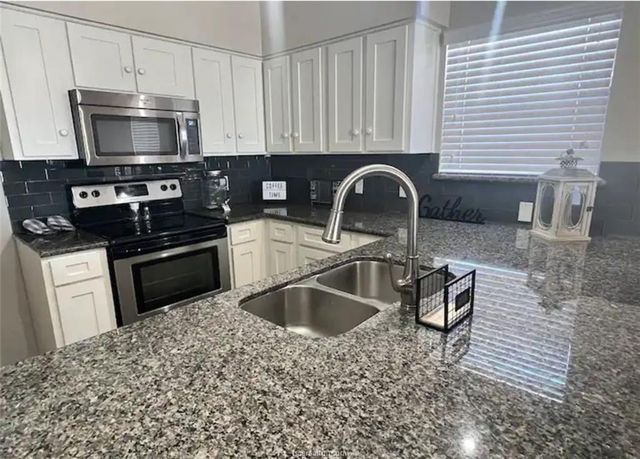 129 April Point Drive, Conroe, TX 77356
