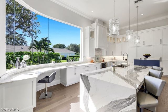 12924 Bald Cypress LN, Naples, FL 34119